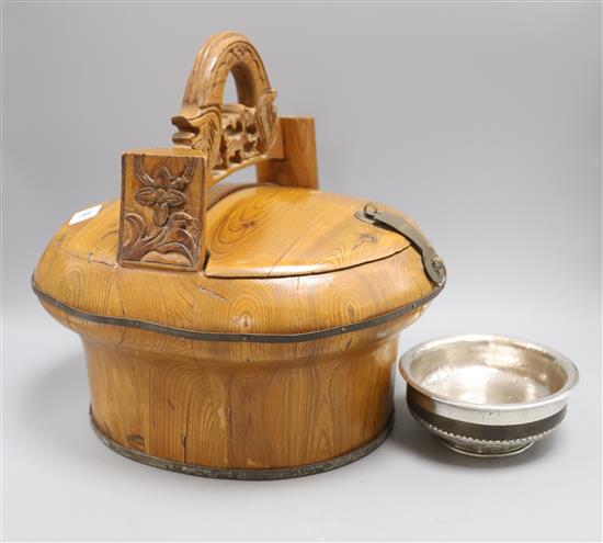 A 19th century Tibetan or Chinese silver mounted alms bowl and a Chinese pine lunch picnic box